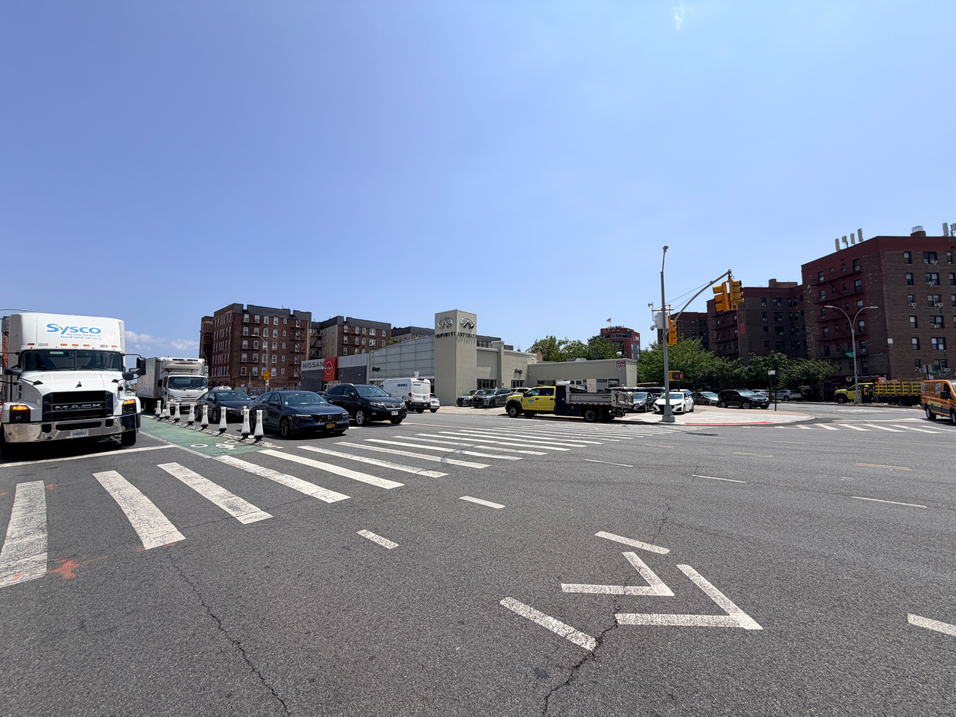 20 Neptune Avenue — corner view across the intersection at Ocean Parkway